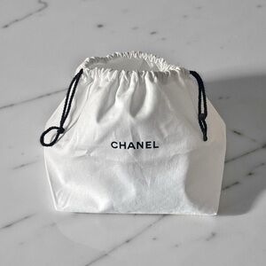Authentic CHANEL White Bag with Black Drawstring